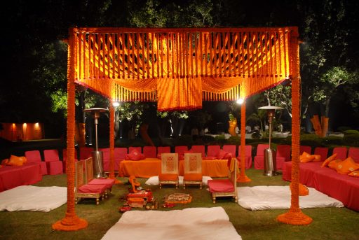 traditional mandap design fully decorated with marigold flowers