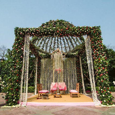 Garden Theme floral Dome shaped Mandap with Tuberoses' Curtains & Chandelier