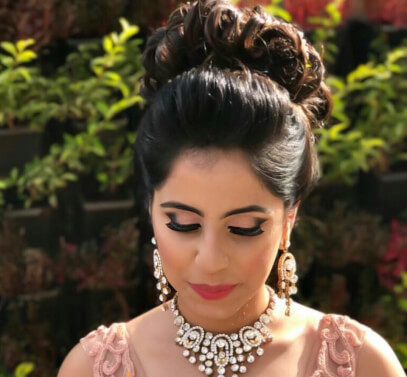 top knot, bridal bun. bridal hair, bridal makeup