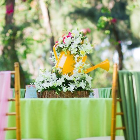 Watering can centrepieces