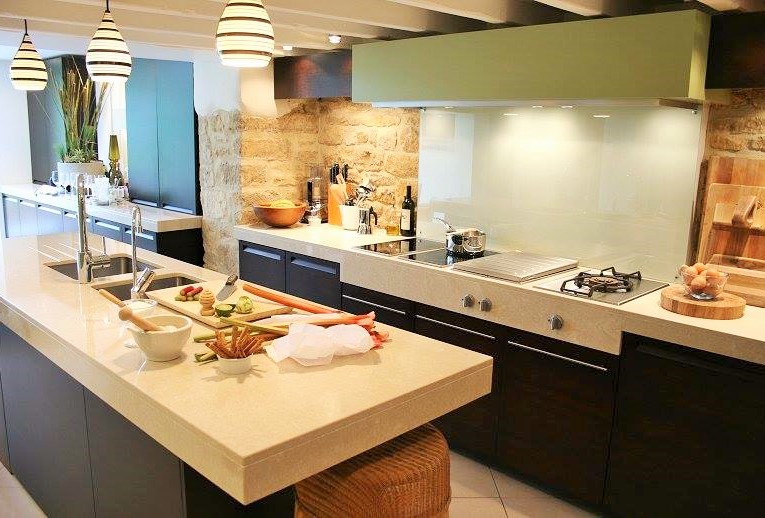 Single wall kitchen with parallel island sink