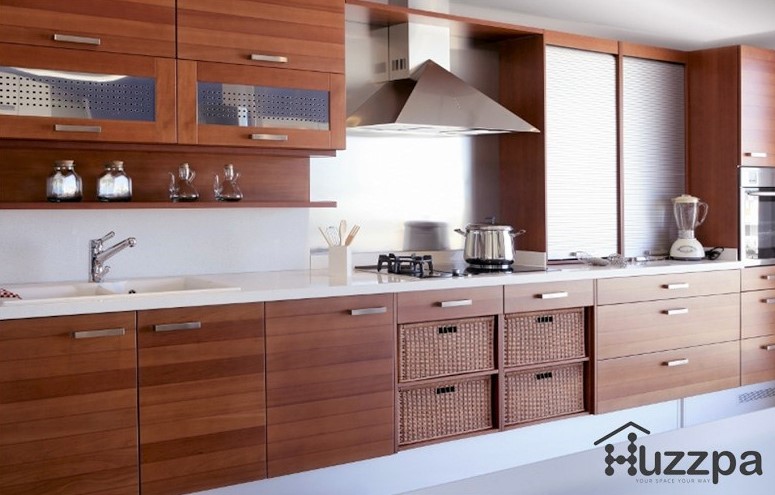 Kitchen with wooden cabinets and pull-out baskets