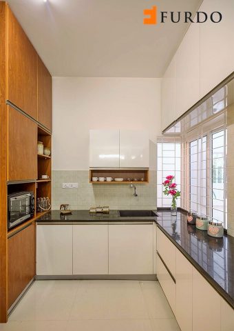Minimal kitchen with full wall storage