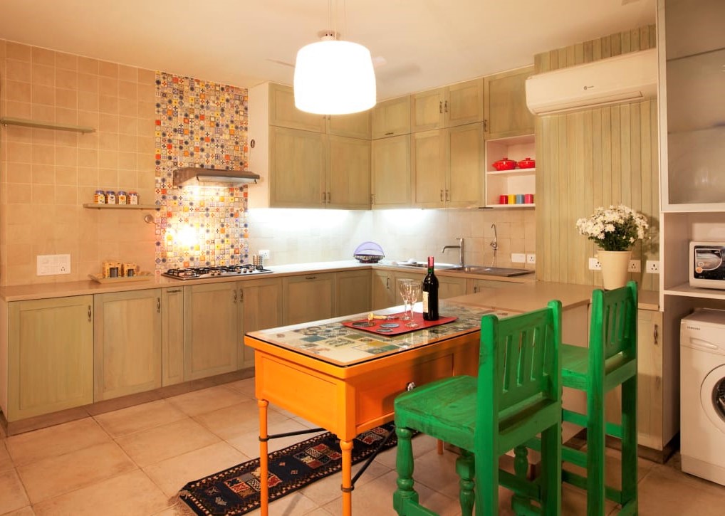 Kitchen with colourful breakfast peninsula