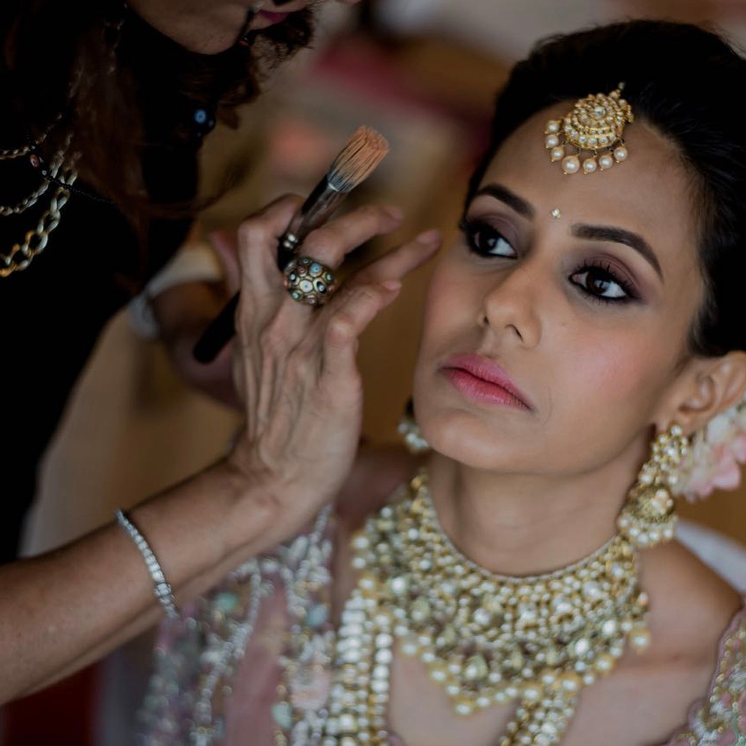 wedding makeup tips - applying base(primer and foundation) on neck and chest as well