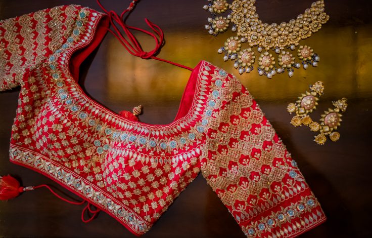 Red blouse design with slightly long sleeves