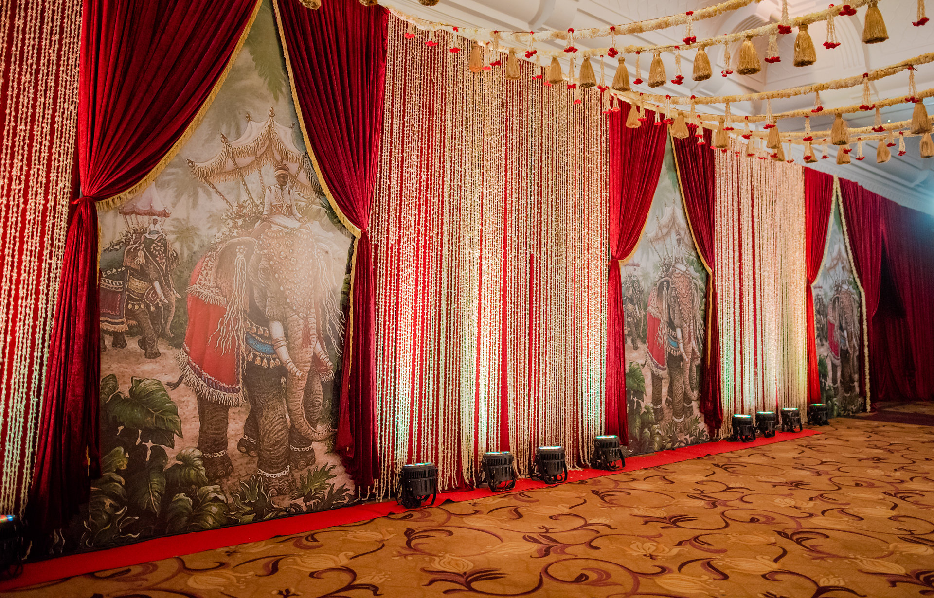 white and red with forest theme wedding decor idea - passageway