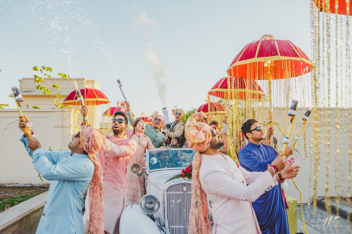 Cold pyros held by groom's friends for his entry - groom entry ideas